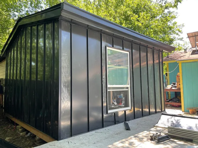 Black standing seam metal wall panels for Roof Inspection in Largo