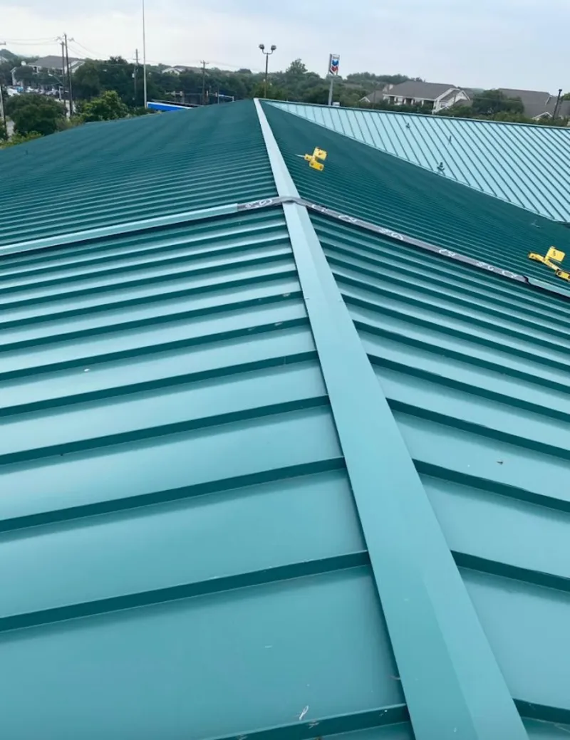 Green commercial metal roof ridge and valley for Metal Roof Repair in Largo